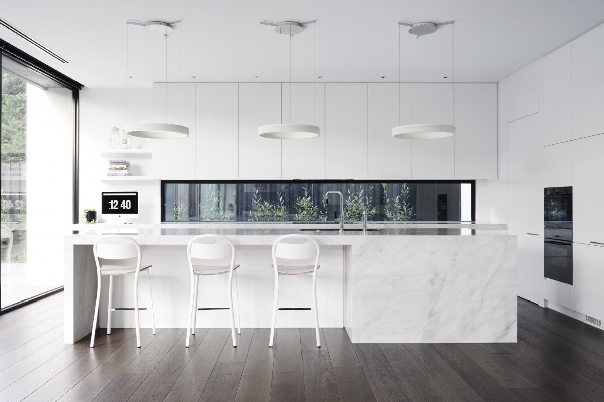 White-Marble-Island-Kitchen-Dark-Wood-Floors